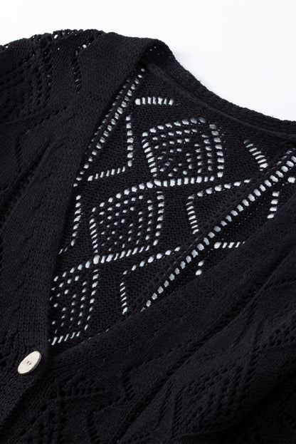 Schwarze durchbrochene strickjacke mit lochmuster