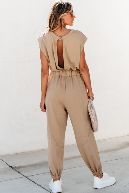 Light french beige cap sleeve open back drawstring jogger jumpsuit