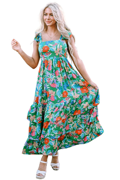 Grünes ärmelloses maxikleid mit blumendruck und rüschenbesatz