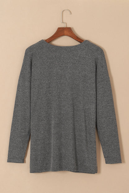 Strickjacke mit taschen und knopfleiste in grauem heidekraut