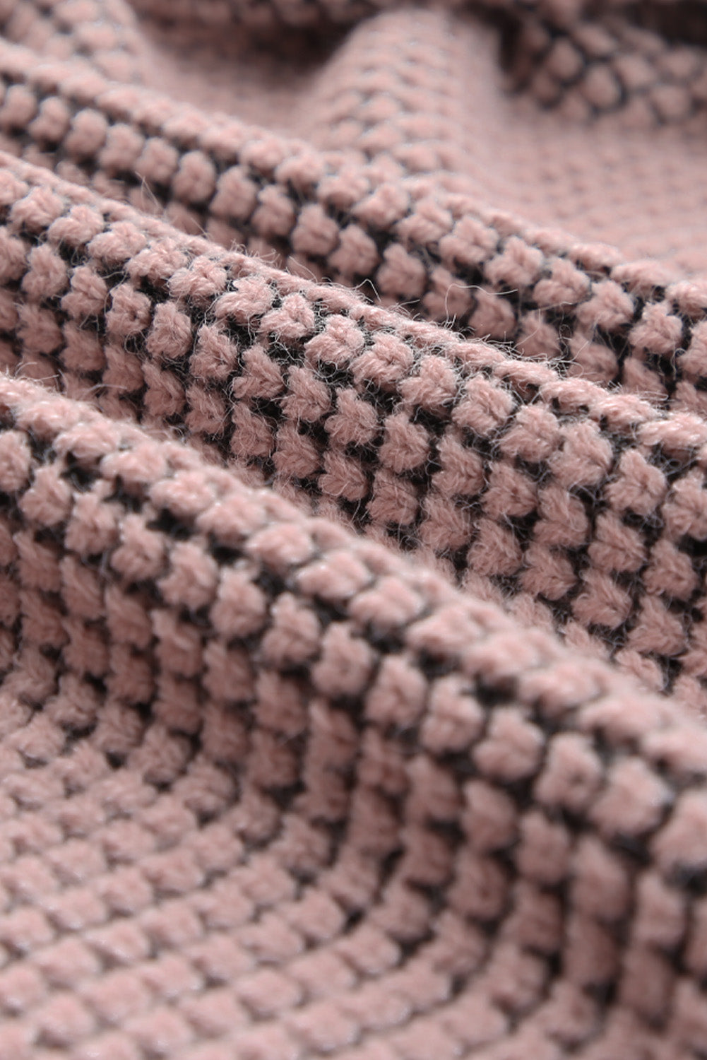 Rosa strickjacke mit waffelstrick und übergroßem kragen