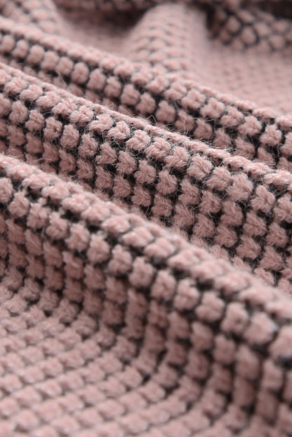 Rosa strickjacke mit waffelstrick und übergroßem kragen