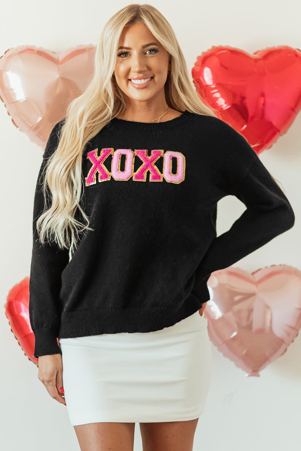 Schwarzer xoxo glitter print rundhalsausschnitt casual pullover