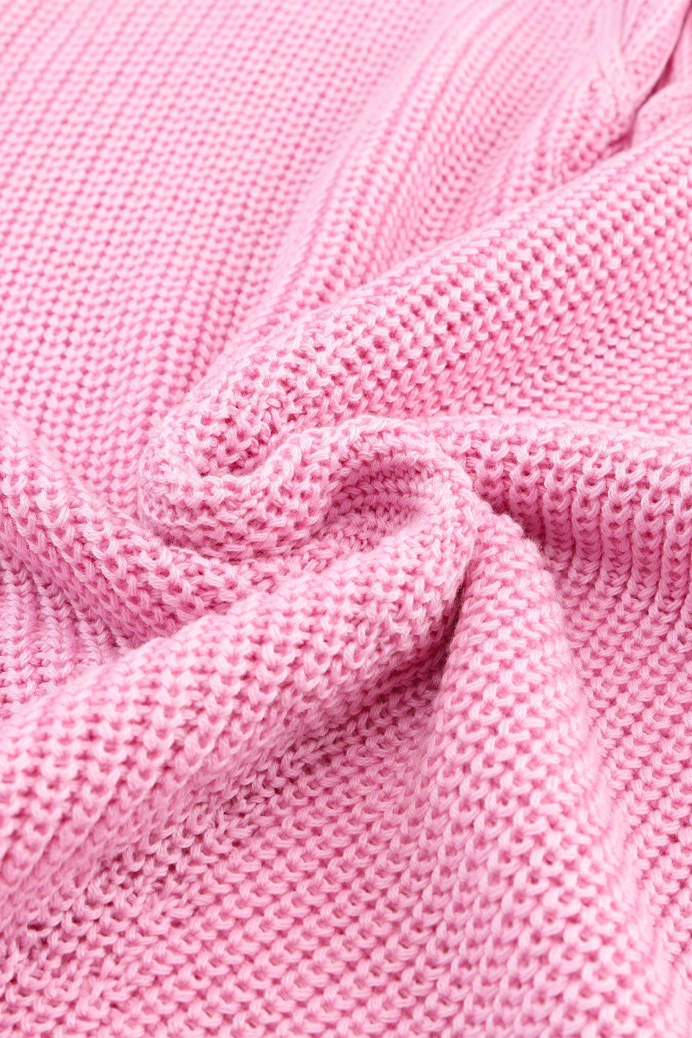 Rosa pullover mit v-ausschnitt aus rippenstrick