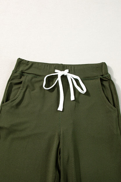 Moosgrüne jogginghose mit kordelzug an der taille
