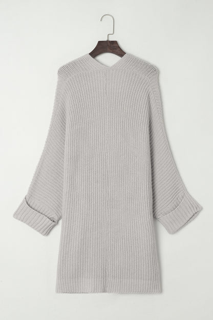 Grauer übergroßer pullover mit umgeschlagenen ärmeln cardigan