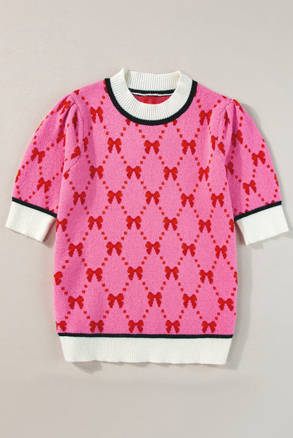 Rosa kurzarm-pullover mit schleifendruck
