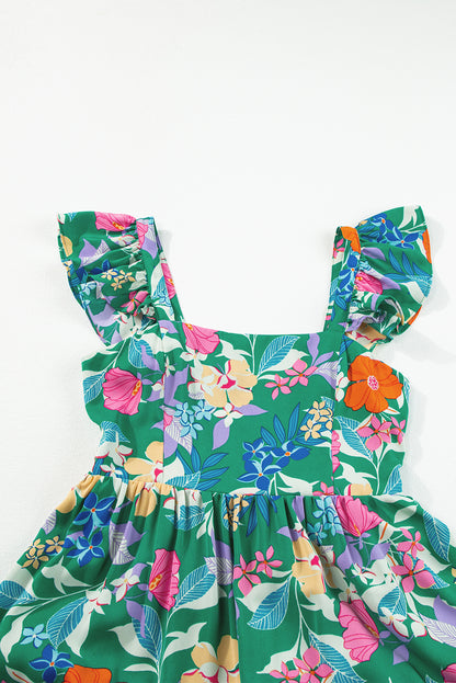Grünes ärmelloses maxikleid mit blumendruck und rüschenbesatz