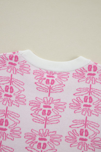 Weißer pullover mit blumenmuster und gerafften kurzen ärmeln